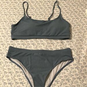 Ladies NWOT blue swimsuit two piece. Still has the hygiene pad in it.